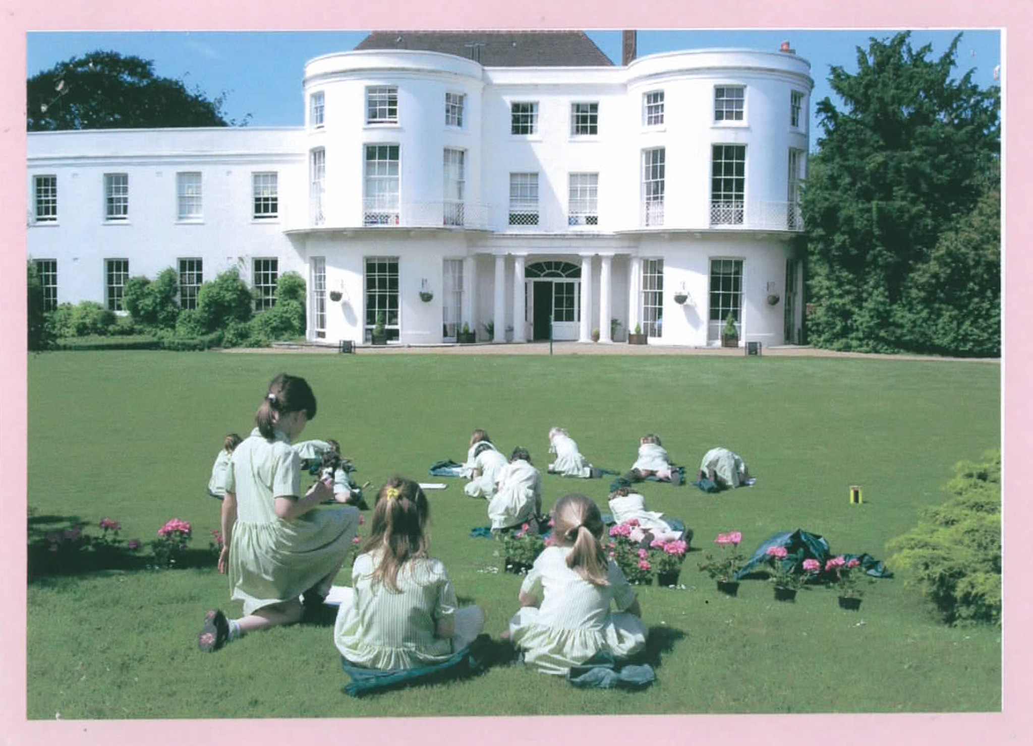 Girls-on-lawn-in-front-of-house