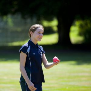 student holding a ball