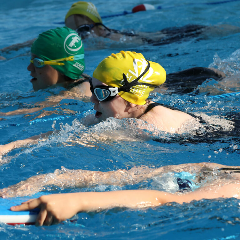 students swimming